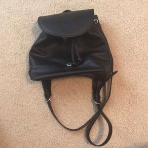 Black purse backpack